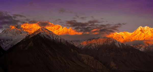 Scenic view of mountains against sky during sunset