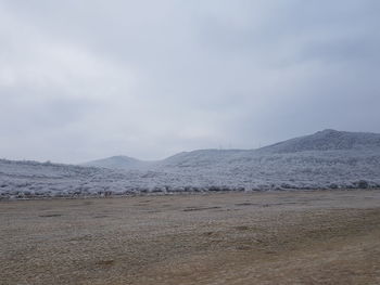 Scenic view of desert against sky