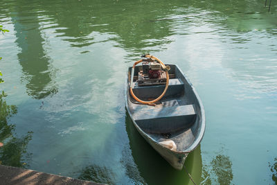 High angle view of boat moored in lake