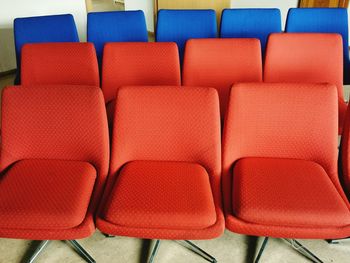 Close-up of empty chairs in waiting hall