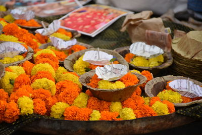 High angle view of various flowers on display at market stall