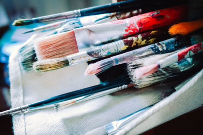 High angle view of paintbrushes on table