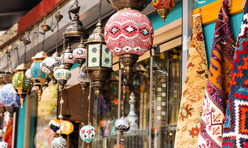 Multi colored lanterns hanging on street market