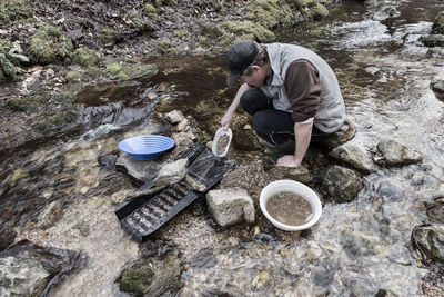 High angle view of man on rock