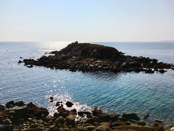 Scenic view of sea against clear sky