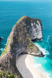 High angle view of rock formation in sea