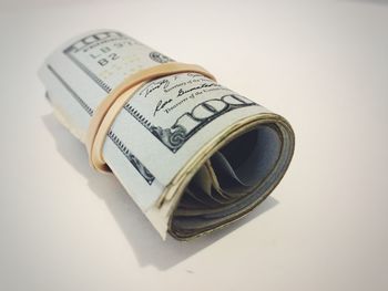 Close-up of camera over white background