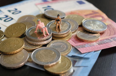 Close-up of coins on table