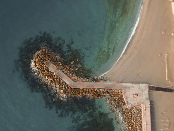 High angle view of umbrella on beach