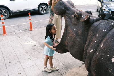 Full length of woman standing outdoors