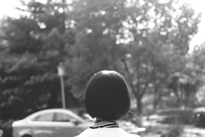 Rear view of girl in car