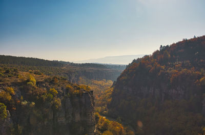Scenic view of landscape against sky during autumn