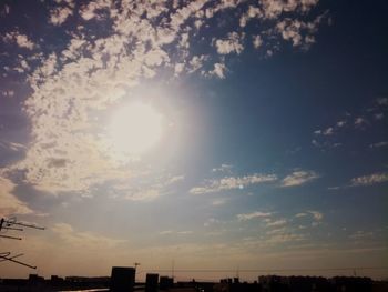 Low angle view of silhouette buildings against sky during sunset