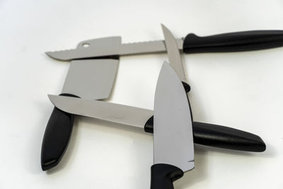 Close-up of knife on white background