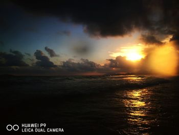 Scenic view of sea against sky at sunset