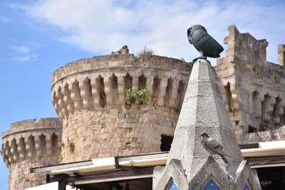 Low angle view of historical building against sky