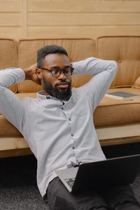 Businessman resting at home