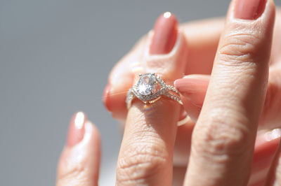 Close-up of human hand holding small