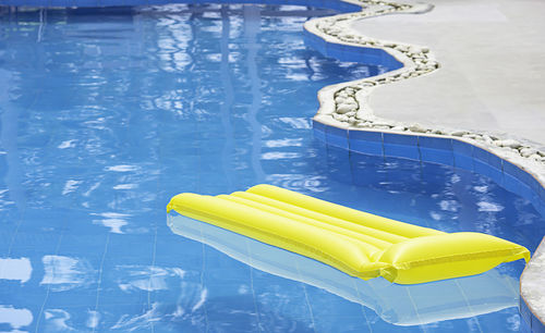 High angle view of yellow swimming pool