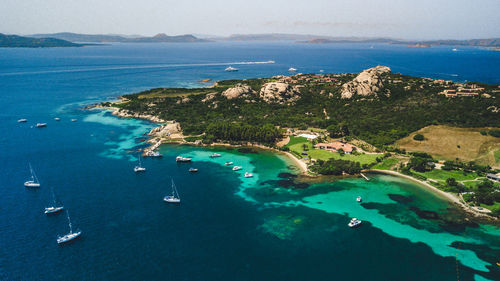 High angle view of sea and bay against sky