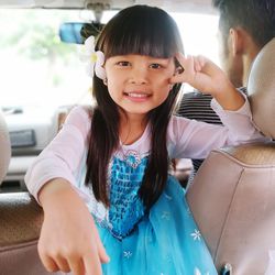 Portrait of cute girl smiling