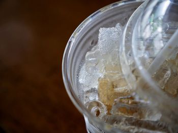 Close-up of drink in disposable glass