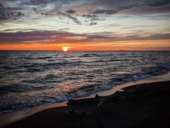 Scenic view of sea against sky during sunset