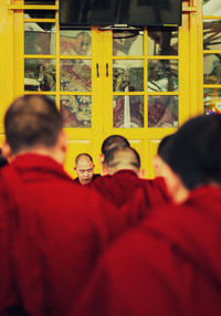 Rear view of people in traditional clothing