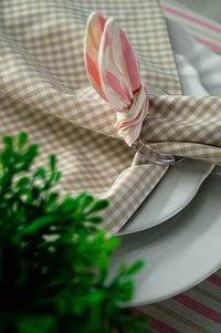 High angle view of pink flower on table