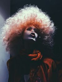 Close-up portrait of woman in snow