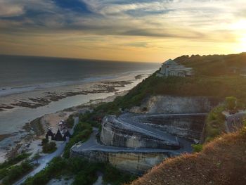 High angle view of beach against sky during sunset