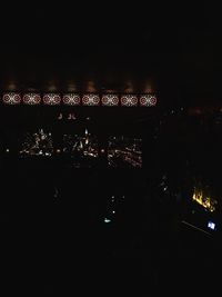 Illuminated buildings in city at night