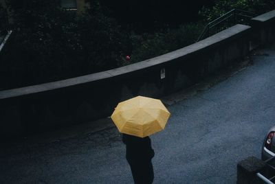 Woman standing on road