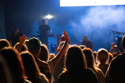 Group of people at music concert