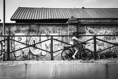 Bicycle parked in front of building