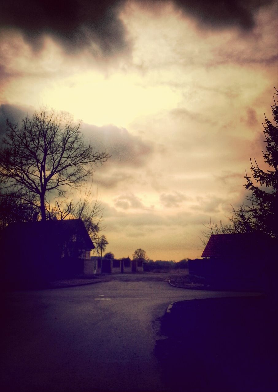 silhouette, sky, sunset, cloud - sky, bare tree, tree, built structure, cloudy, building exterior, architecture, cloud, weather, tranquility, scenics, nature, beauty in nature, tranquil scene, dusk, house, overcast