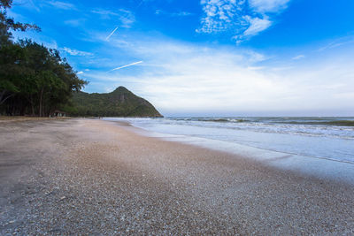 Scenic view of beach against sky