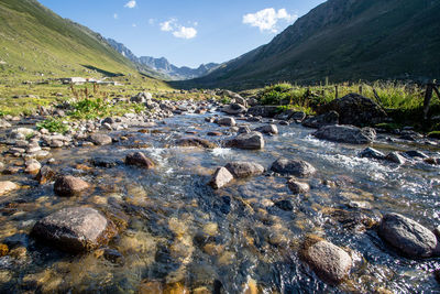 Scenic view of stream against sky