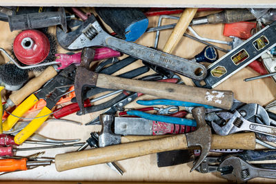 Close-up of old tools on table