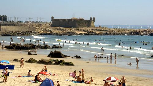 People enjoying at beach