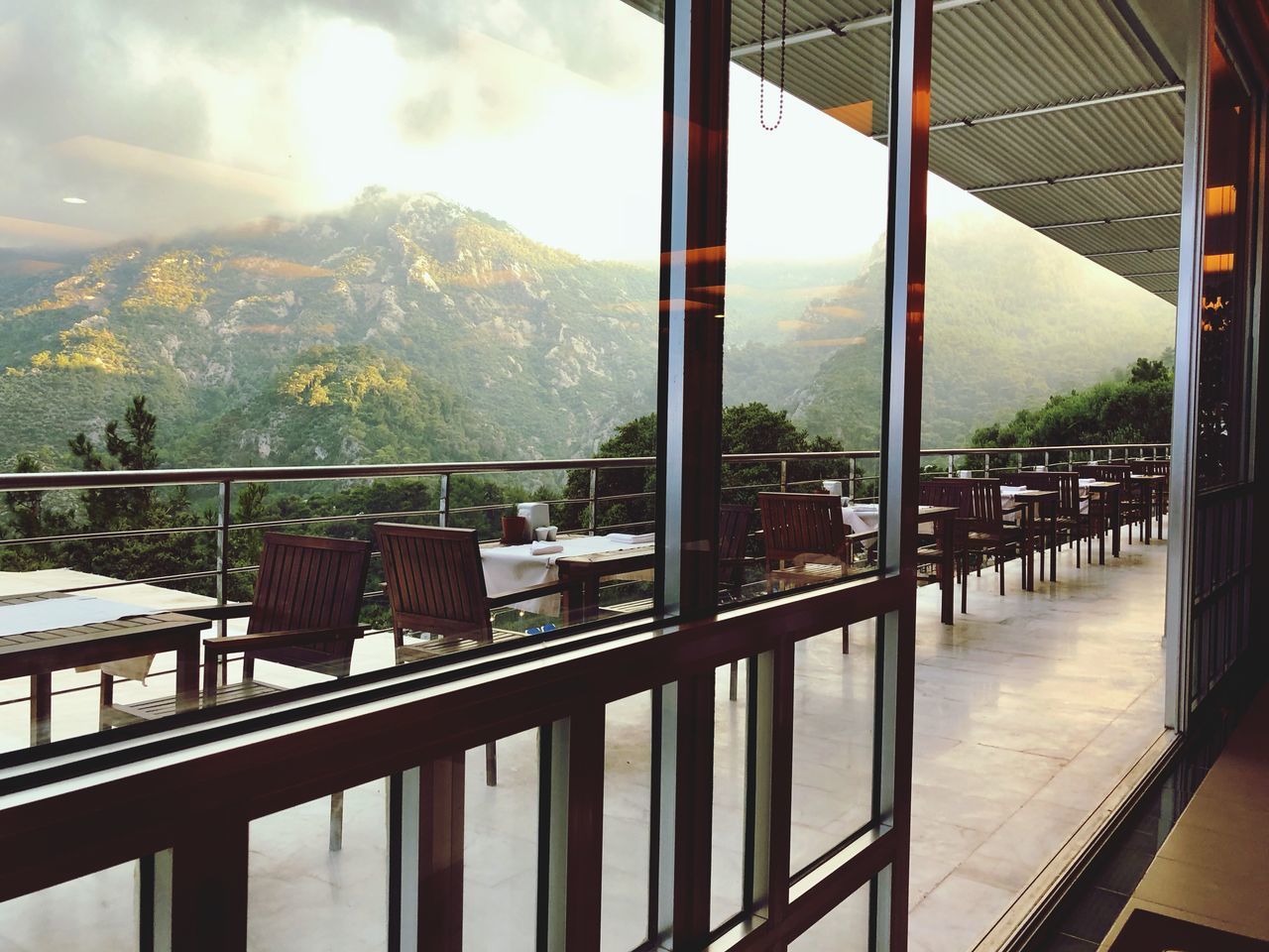 VIEW OF BALCONY THROUGH WINDOW