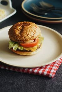 Close-up of burger in plate on table