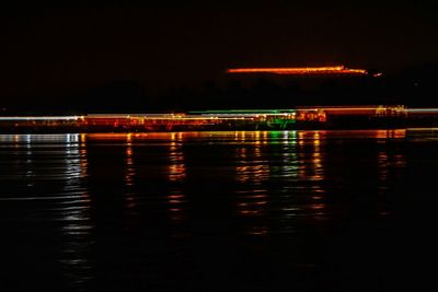 Reflection of illuminated buildings in water