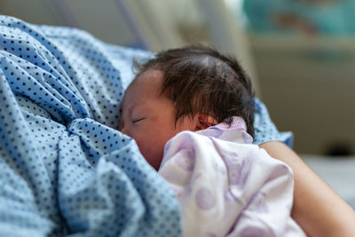 Close-up of cute baby sleeping