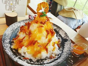 Close-up of served food on table