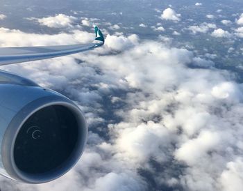 Low angle view of airplane flying in sky