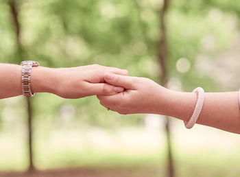 Close-up of hand holding hands