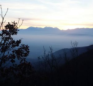 Scenic view of mountains at sunset