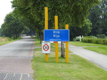 Road sign on street in city