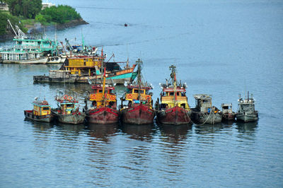 Boats moored in sea